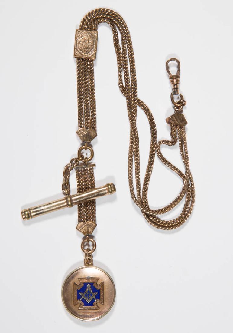 VICTORIAN MASONIC GOLD-FILLED POCKET WATCH SLIDE CHAIN: VICTORIAN MASONIC GOLD-FILLED POCKET WATCH SLIDE CHAIN, multi-strand chain with engraved slide box, bar and circular fobs, latter with applied Masonic emblem. Fourth quarter 19th/early 20th century. 3