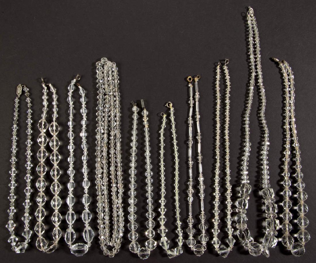 ASSORTED ANTIQUE / VINTAGE FACETED / MOLDED GLASS BEAD: ASSORTED ANTIQUE / VINTAGE FACETED / MOLDED GLASS BEAD COSTUME JEWELRY NECKLACES, LOT OF TEN, all translucent, some with various clasps. Unmarked. Primarily first half 20th century. 14" to 38" LOA.Two