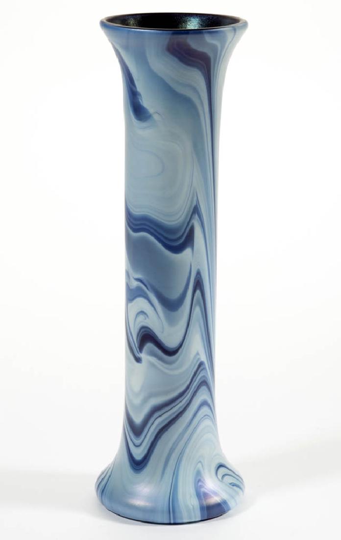 IMPERIAL LEAD LUSTRE MARBLEIZED ART GLASS VASE: IMPERIAL LEAD LUSTRE MARBLEIZED ART GLASS VASE, swirled opal and cobalt blue, Lead Lustre 619-11, blue iridescent interior, polished pontil mark. Imperial Glass Co. Circa 1925. 8 5/8" H, 2 1/2" D rim,