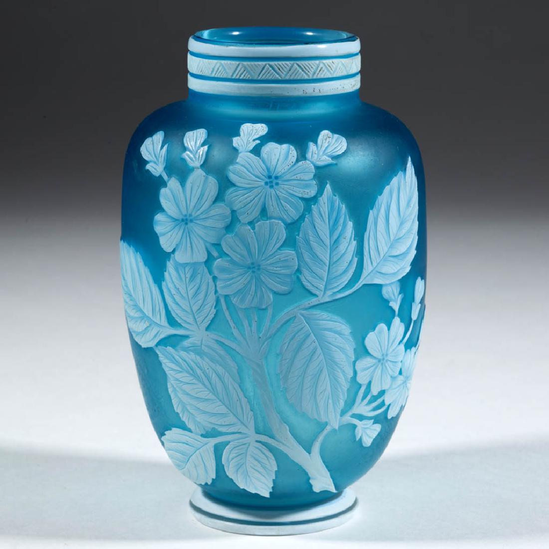 THOMAS WEBB CAMEO ART GLASS VASE: THOMAS WEBB CAMEO ART GLASS VASE, opaque white to blue, floral decoration to one face with a plain reverse, bands to the mouth and foot, polished pontil mark, signature stating "WEBB". Thomas Webb & S