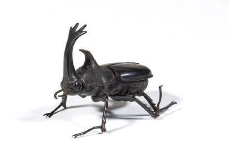 JAPANESE ARTICULATED JIZAI OKIMONO DEPICTING A: JAPANESE ARTICULATED JIZAI OKIMONO DEPICTING A RHINOCEROS BEETLE, finely detailed patinated copper, signed on the underside of proper right interior wing. The school of Takase Kozan (1869-1934). Proba