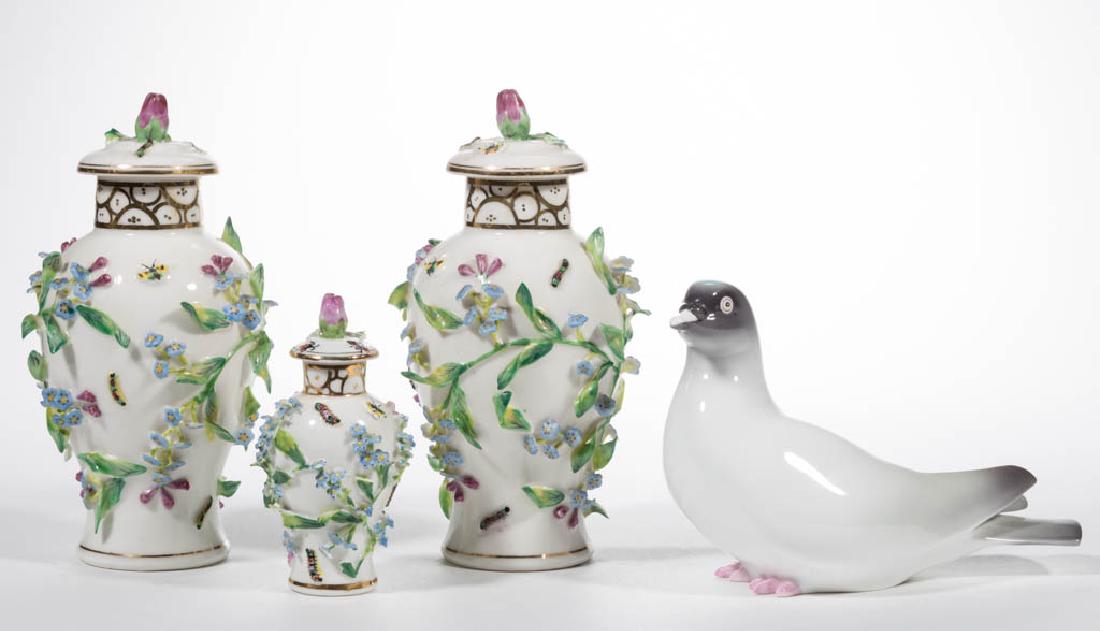 JAPANESE CERAMIC ARTICLES, LOT OF FOUR: JAPANESE CERAMIC ARTICLES, LOT OF FOUR, comprising three covered jars having modeled raised floral and foliate decoration as well as insects, and one bird figure. Bird marked "Noritake / BONE CHINA", 