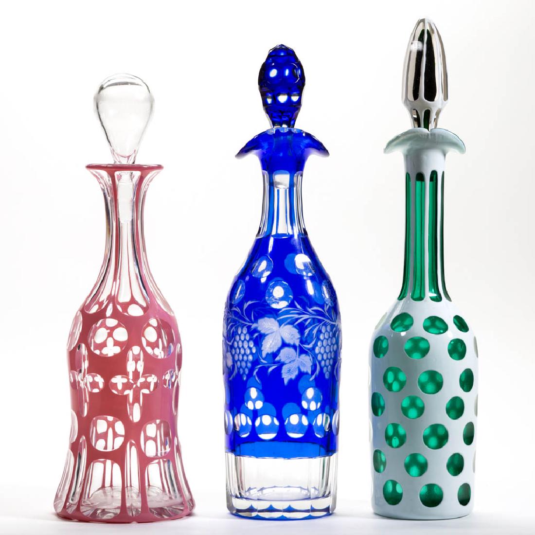 ASSORTED CUT OVERLAY DECANTERS, LOT OF THREE (1 of 1)