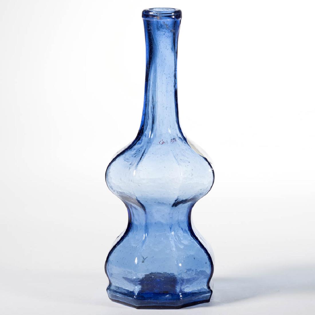 BLOWN-MOLDED PANELLED COMMERCIAL COLOGNE BOTTLE (1 of 1)