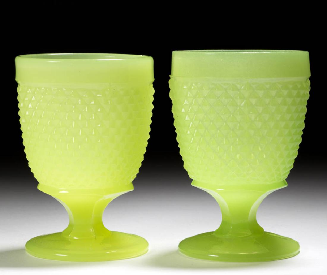 DIAMOND POINT / SHARP DIAMOND (OMN) EGG CUPS / POMADES,: DIAMOND POINT / SHARP DIAMOND (OMN) EGG CUPS / POMADES, LOT OF TWO, translucent yellow and translucent bright yellow, each with a deep cup raised on hexagonal stem and plain circular foot. Boston & Sa
