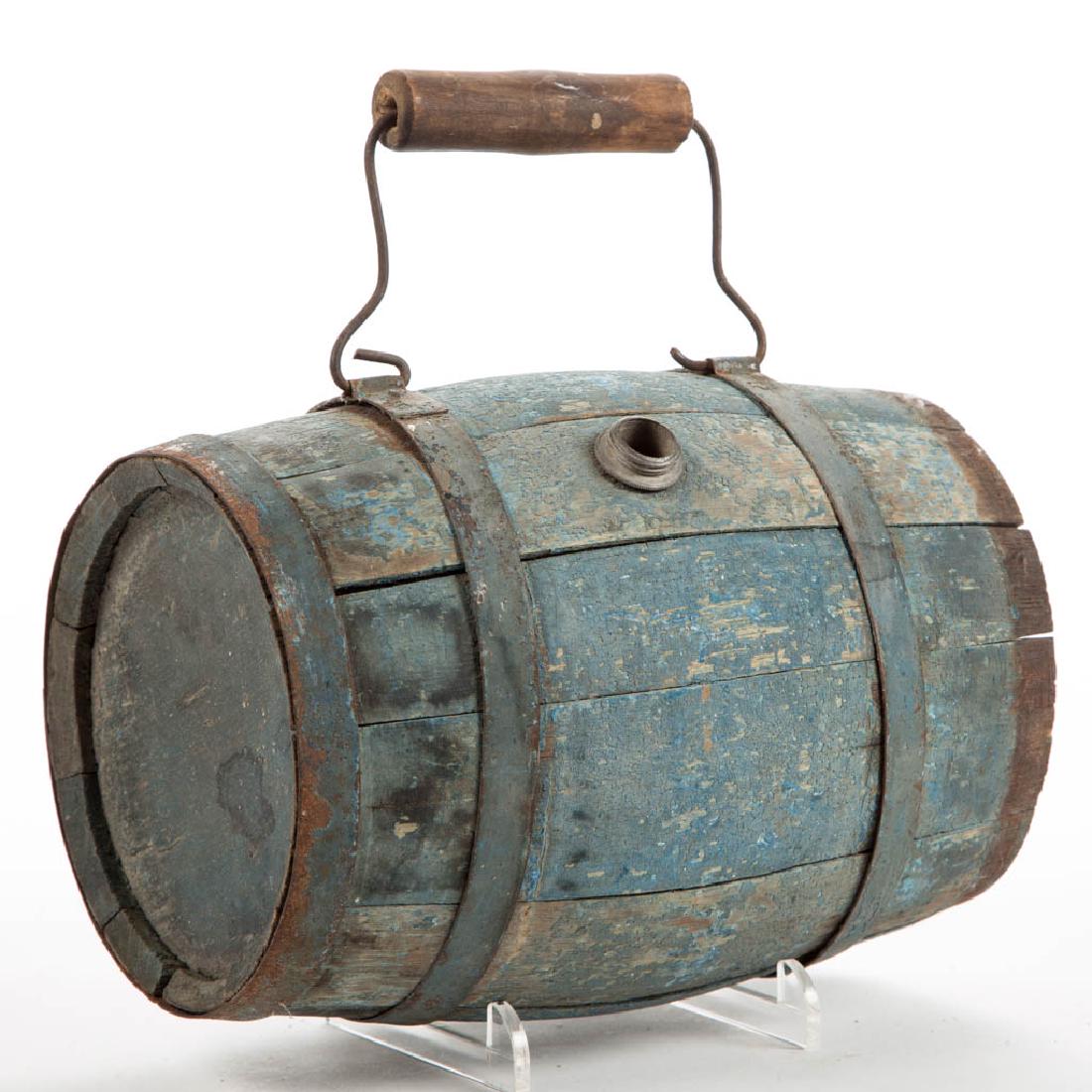 MID-ATLANTIC PAINTED OAK-STAVE RUNDLET: MID-ATLANTIC PAINTED OAK-STAVE RUNDLET, secured with metal bands, fitted with bail handle and metal screw closure. Original dry Prussian-blue painted surface. Second half 19th century. 6" D ends, 9 1/