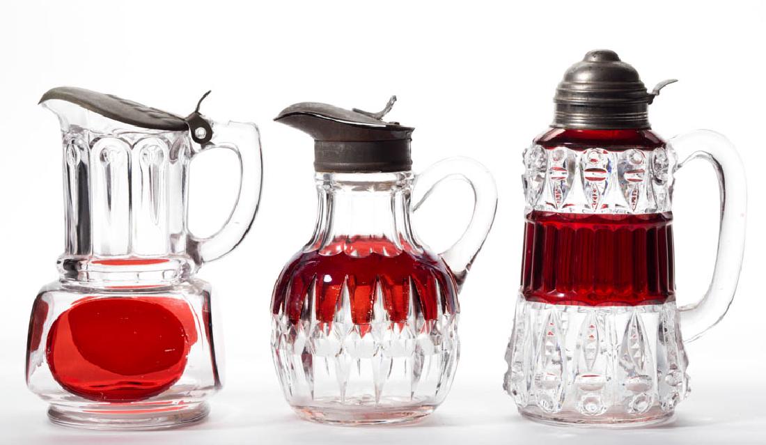 ASSORTED EAPG - RUBY-STAINED SYRUP PITCHERS, LOT OF (1 of 1)