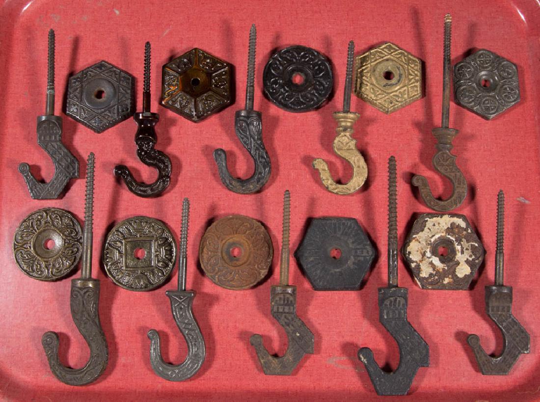 ASSORTED CAST-IRON CEILING HOOKS, LOT OF TEN (1 of 1)
