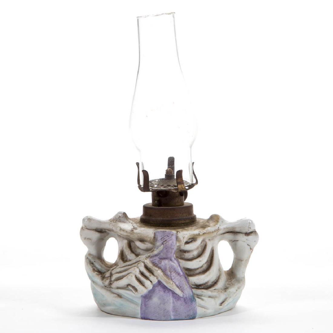 BISQUE FIGURAL SKELETON - SMALL MINIATURE LAMP BASE / (1 of 1)