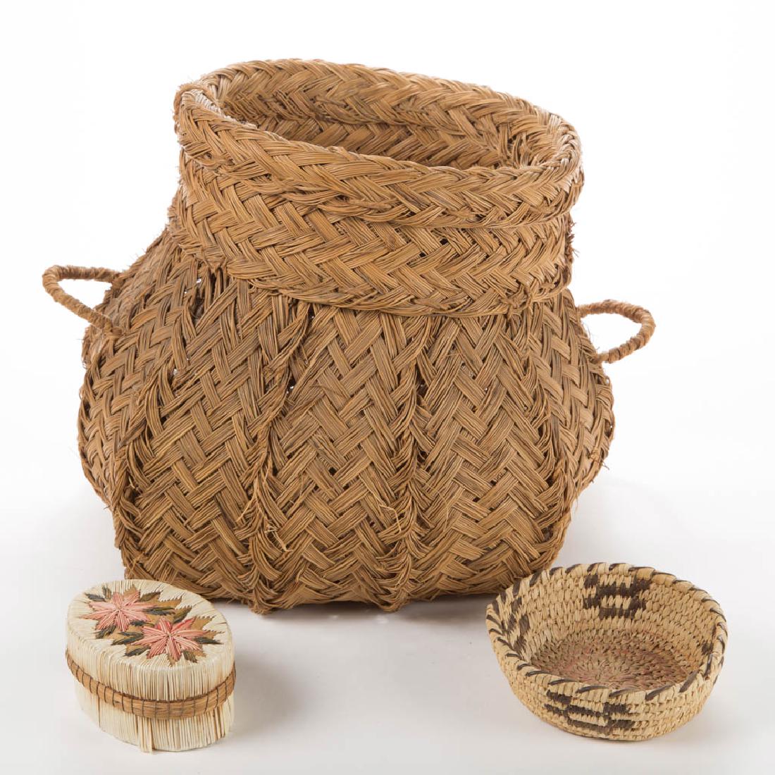 NATIVE AMERICAN AND OTHER BASKETS, LOT OF THREE: NATIVE AMERICAN AND OTHER BASKETS, LOT OF THREE, including a small oval porcupine quill with double-star top. 20th century. 1 3/4" to 11" HOA. Quill example with some breaks and a few losses around ba