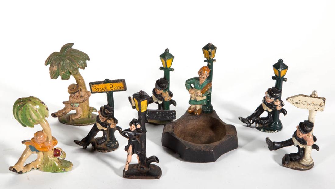 VINTAGE FIGURAL CAST IRON BOTTLE OPENERS, LOT OF EIGHT (1 of 1)