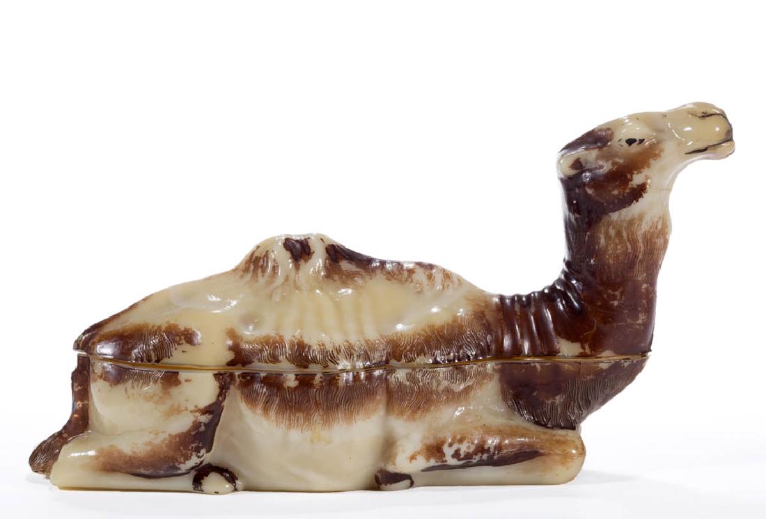 VALLERYSTHAL DROMEDARY CAMEL COVERED DISH: VALLERYSTHAL DROMEDARY CAMEL COVERED DISH, opaque caramel with original paint decoration, embossed "VALLERYSTHAL" on underside of base. First quarter 20th century. 4 1/4" HOA, 3" x 8 1/2" base rim. Co