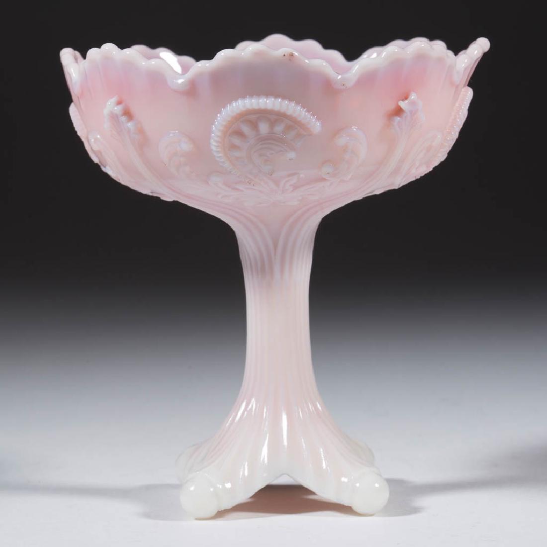INVERTED FAN AND FEATHER JELLY COMPOTE: INVERTED FAN AND FEATHER JELLY COMPOTE, pink slag. Northwood Glass Co./Dugan Glass Co. Circa 1904. 5" H, 4 1/2" D rim. Undamaged. Literature: Heacock/Measell/Wiggins - Dugan/Diamond: The Story of Indi