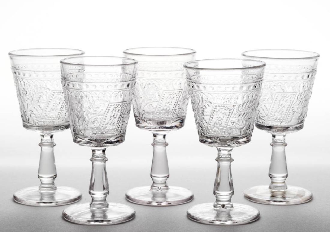 GOOD LUCK / HORSESHOE WINES, LOT OF FIVE: GOOD LUCK / HORSESHOE WINES, LOT OF FIVE, colorless. Fourth quarter 19th century. 4" H. Undamaged. Provenance: From the William and Mary Jane Lightner collection, Petersburg, PA.