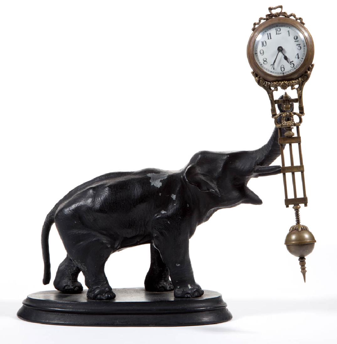 FIGURAL ELEPHANT SWING MODEL CLOCK (1 of 2)