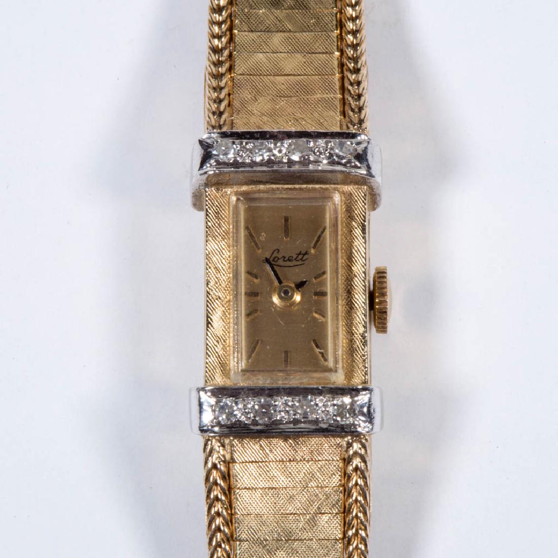 VINTAGE SWISS LORETT 14K YELLOW GOLD AND DIAMOND LADY'S: VINTAGE SWISS LORETT 14K YELLOW GOLD AND DIAMOND LADY'S WRIST WATCH, case and band marked, 17-jewel movement, brushed metal dial, case set with eight melee diamonds. Total weight without movement: 26.