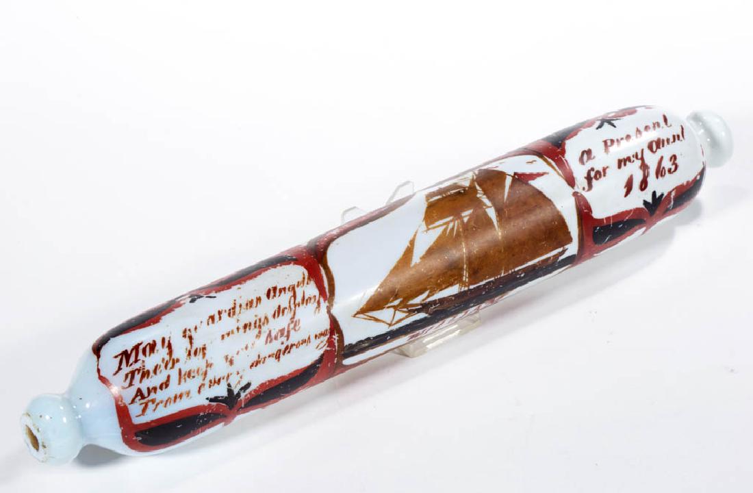 ENGLISH FREE-BLOWN SAILOR'S PRESENTATION ROLLING PIN: ENGLISH FREE-BLOWN SAILOR'S PRESENTATION ROLLING PIN, fiery opalescent, polychrome-enamel decoration stating "A PRESENT FOR MY AUNT/1863" also "WILLIAM", decoration featuring a central sailing ship, p
