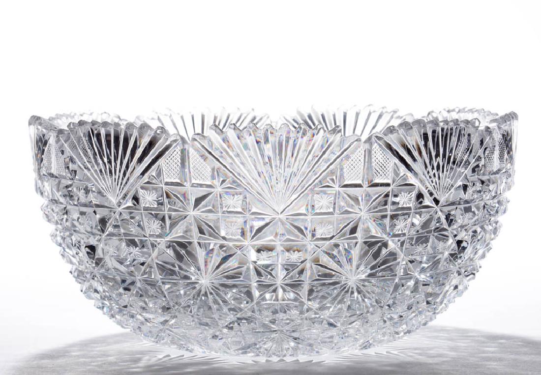 PACKWOOD BRILLIANT CUT GLASS BOWL: PACKWOOD BRILLIANT CUT GLASS BOWL, colorless lead glass, with a daisy and blocked zig-zags and fan motif, hobstar with fans to the base. Attributed to N. Packwood and Co. renting the cutting shop at t