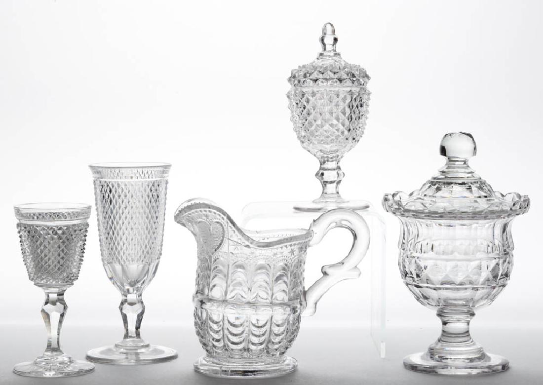 ASSORTED FLINT EAPG ARTICLES, LOT OF FOUR: ASSORTED FLINT EAPG ARTICLES, LOT OF FOUR, colorless lead glass, comprising a Sawtooth covered salt, a Diamond Point jelly glass, a Cut Diamond Point wine, and a Lacy Heart and Scale creamer. Together