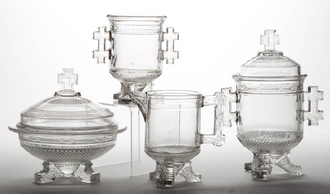 QUEEN ANNE FOUR-PIECE TABLE SET: QUEEN ANNE FOUR-PIECE TABLE SET, colorless, comprising a covered butter dish, covered sugar bowl, creamer, and spooner. LaBelle Glass Co. Circa 1880. 5" to 8 3/8" HOA. Butter and sugar nearly undamage