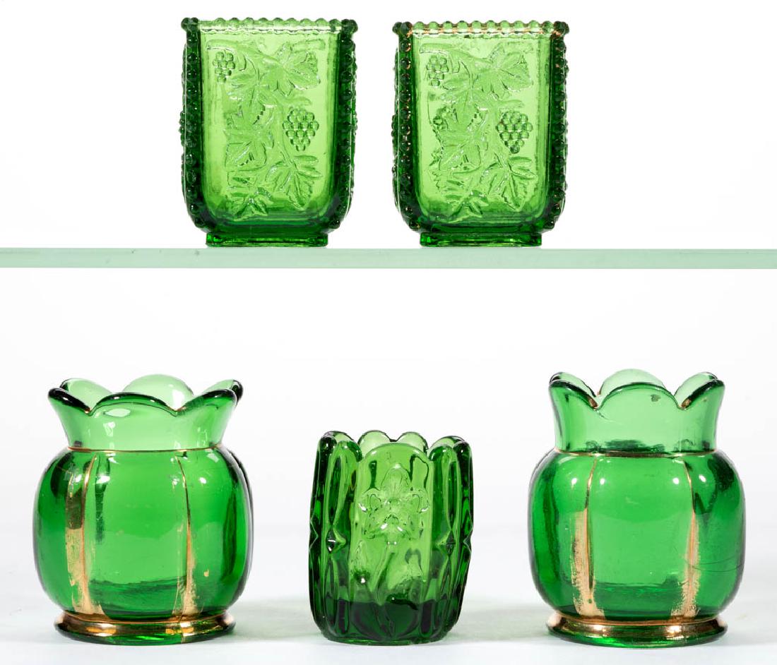 ASSORTED EAPG TOOTHPICK HOLDERS, LOT OF FIVE: ASSORTED EAPG TOOTHPICK HOLDERS, LOT OF FIVE, green, comprising two California, two X-Ray, and a Florida example. Various makers. Fourth quarter 19th/first quarter 20th century. 2 1/4" to 2 7/8" H.X-R