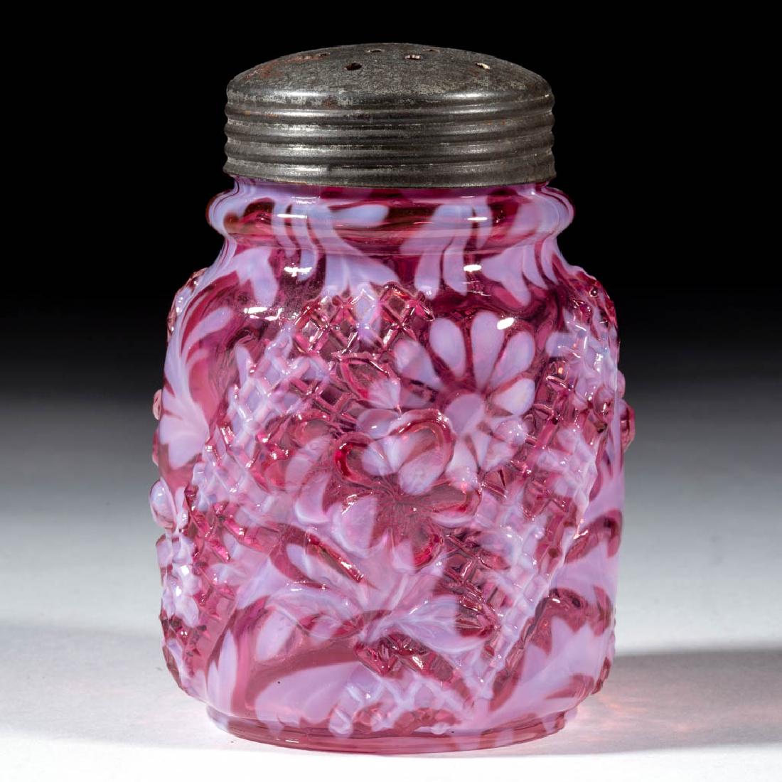 DAISY AND FERN - APPLE BLOSSOM MOLD SUGAR SHAKER: DAISY AND FERN - APPLE BLOSSOM MOLD SUGAR SHAKER, cranberry opalescent, period lid. Northwood Glass Co. Circa 1895. 4 3/8" H. Undamaged. Typical roughness to the mouth, as made. Literature: Parallels 
