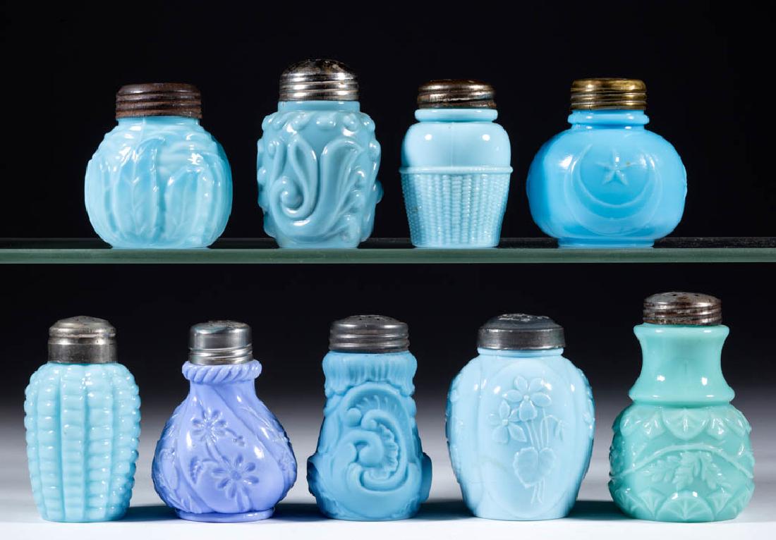ASSORTED OPAQUE GLASS SALT AND PEPPER SHAKERS, LOT OF: ASSORTED OPAQUE GLASS SALT AND PEPPER SHAKERS, LOT OF NINE, opaque blue and opaque green, including a Leaf Mold, a Dithridge Ear, and a Gaudy Scroll, each with a period lid. Various makers. Late 19th/