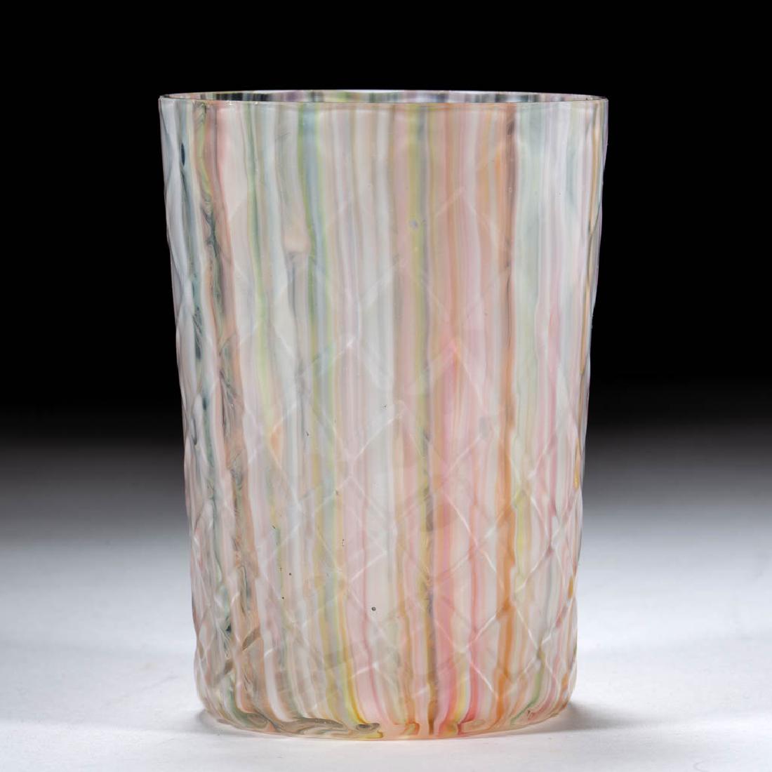 BLOWN VENETIAN-DIAMOND RAINBOW STRIPE TUMBLER: BLOWN VENETIAN-DIAMOND RAINBOW STRIPE TUMBLER, colorless with various colored stripes, factory-polished rim. Maker unverified. Late 19th/early 20th century. 3 3/4" H. Undamaged.