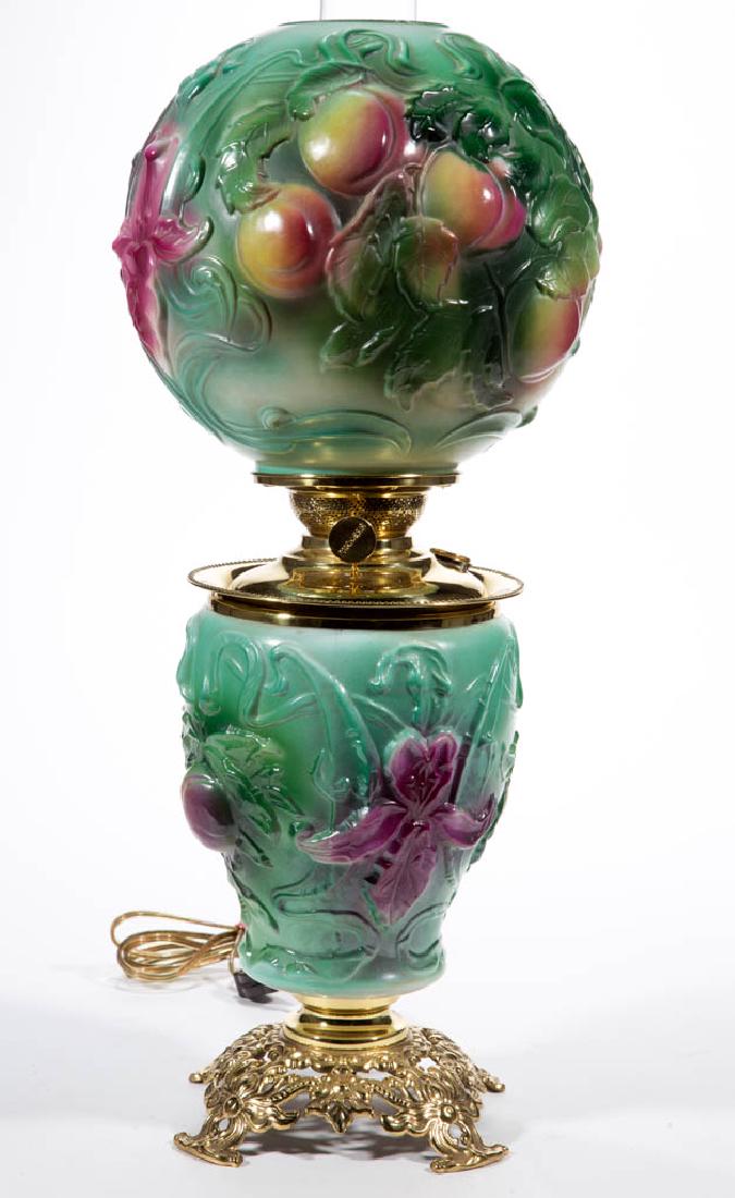 PITTSBURGH PEACHES PARLOR / GONE WITH THE WIND LAMP: PITTSBURGH PEACHES PARLOR / GONE WITH THE WIND LAMP, green ground with embossed peach and leaf pattern, matching pattern and decorated ball-form shade; elongated-form font vase with cast-brass spill r