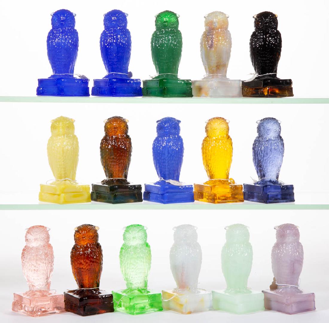 DEGENHART GLASS OWL FIGURES, LOT OF 16: DEGENHART GLASS OWL FIGURES, LOT OF 16, various colors, including old custard and blue fire slag. Each with Degenhart "D" mark. Crystal Art Glass Co., Cambridge, OH. Second half 20th century. 3 5/8" H
