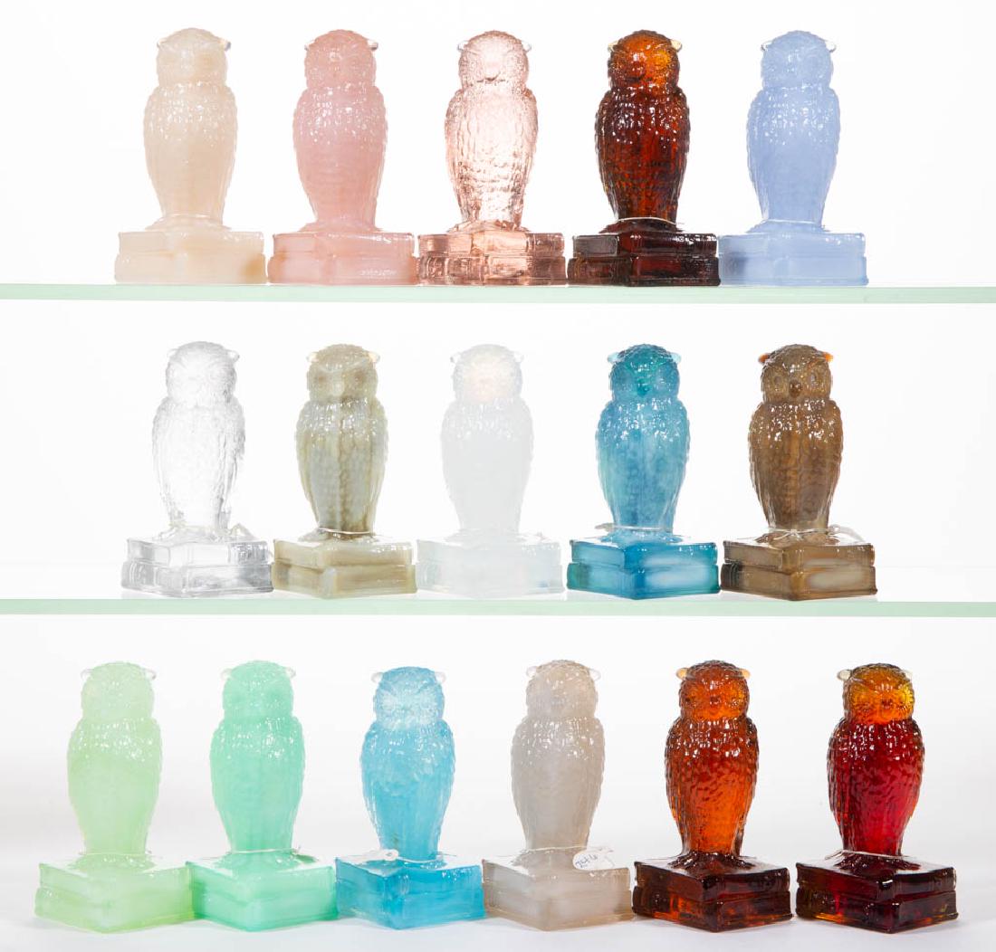 DEGENHART GLASS OWL FIGURES, LOT OF 16: DEGENHART GLASS OWL FIGURES, LOT OF 16, various colors, including crown tuscan and Smokey bear. Each with Degenhart "D" mark. Crystal Art Glass Co., Cambridge, OH. Second half 20th century. 3 5/8" H. 
