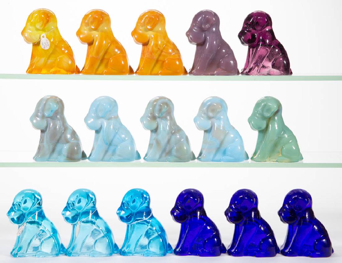 DEGENHART GLASS DOG / POOCH FIGURES, LOT OF 16: DEGENHART GLASS DOG / POOCH FIGURES, LOT OF 16, various colors, including buttercup slag and bluebell. Each with Degenhart "D" mark. Crystal Art Glass Co., Cambridge, OH. Second half 20th century. 3"