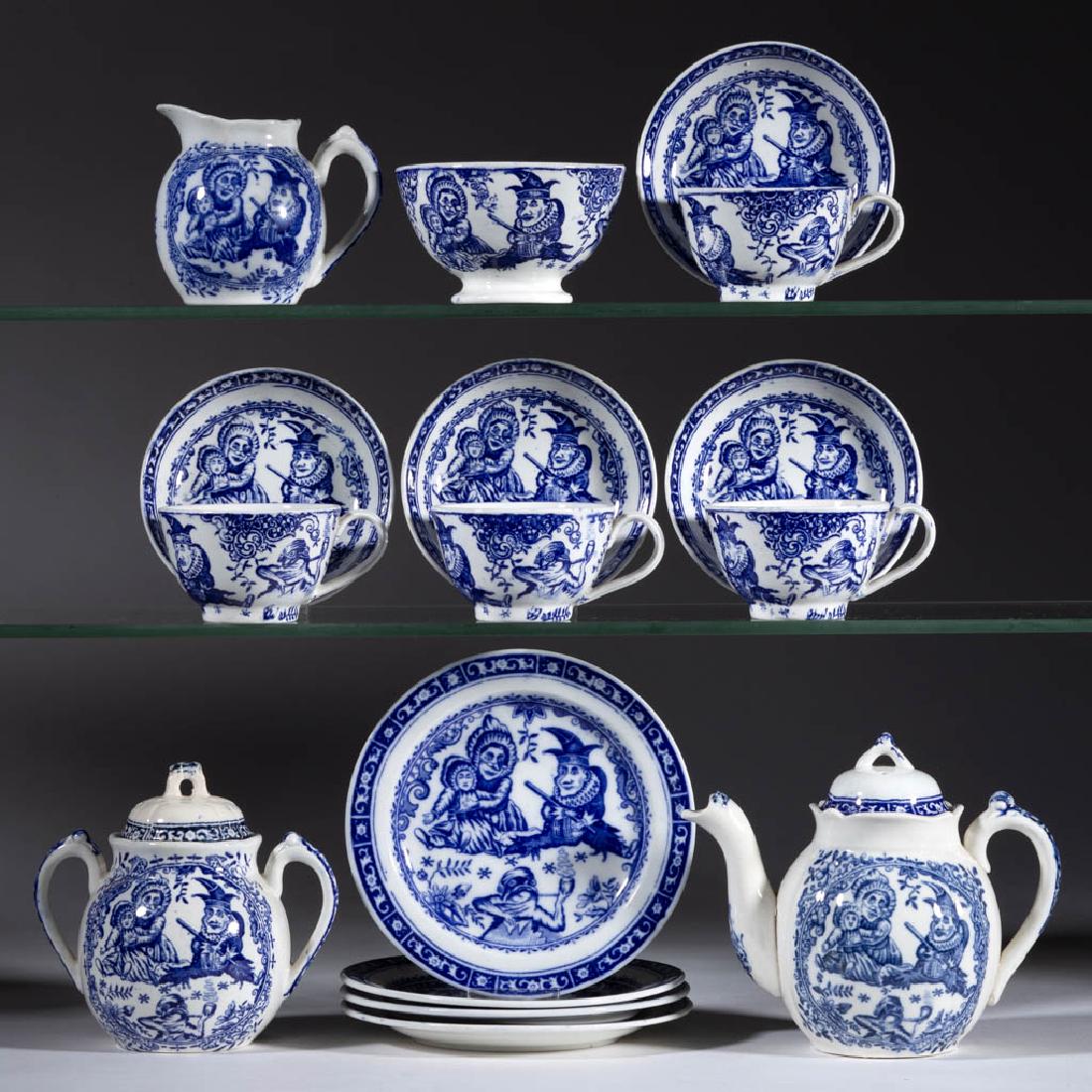 ENGLISH STAFFORDSHIRE "PUNCH AND JUDY" TRANSFER-PRINTED: ENGLISH STAFFORDSHIRE "PUNCH AND JUDY" TRANSFER-PRINTED CERAMIC CHILDREN'S TOY 16-PIECE TEA SET, comprising a covered teapot, a covered open-handled sugar, a creamer, a 3 3/4" waste bowl, four cups an
