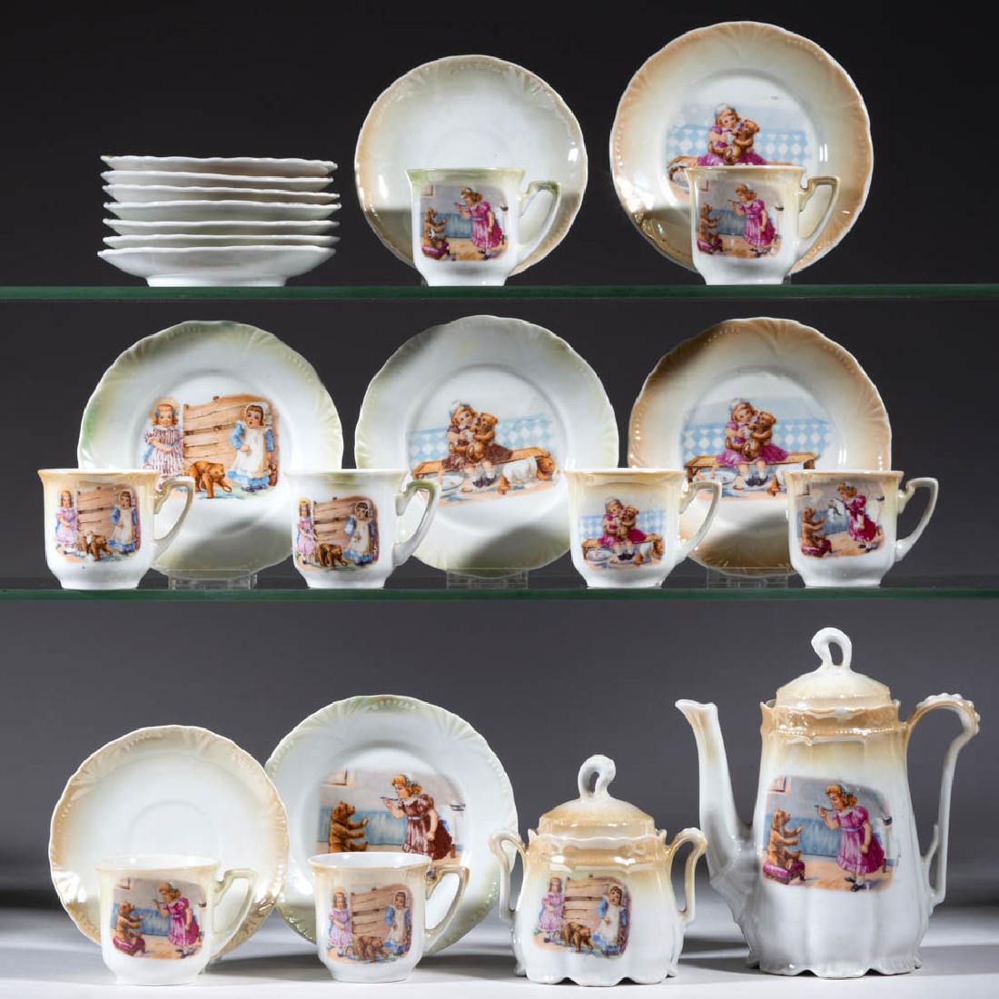 GERMAN PORCELAIN TEDDY BEARS CHILDREN'S TOY 24-PIECE: GERMAN PORCELAIN TEDDY BEARS CHILDREN'S TOY 24-PIECE TEA SET, comprising one 6 1/4" HOA covered teapot, one covered sugar, five plates, eight cups and saucers, and one 4 1/2" D saucer, each having lig