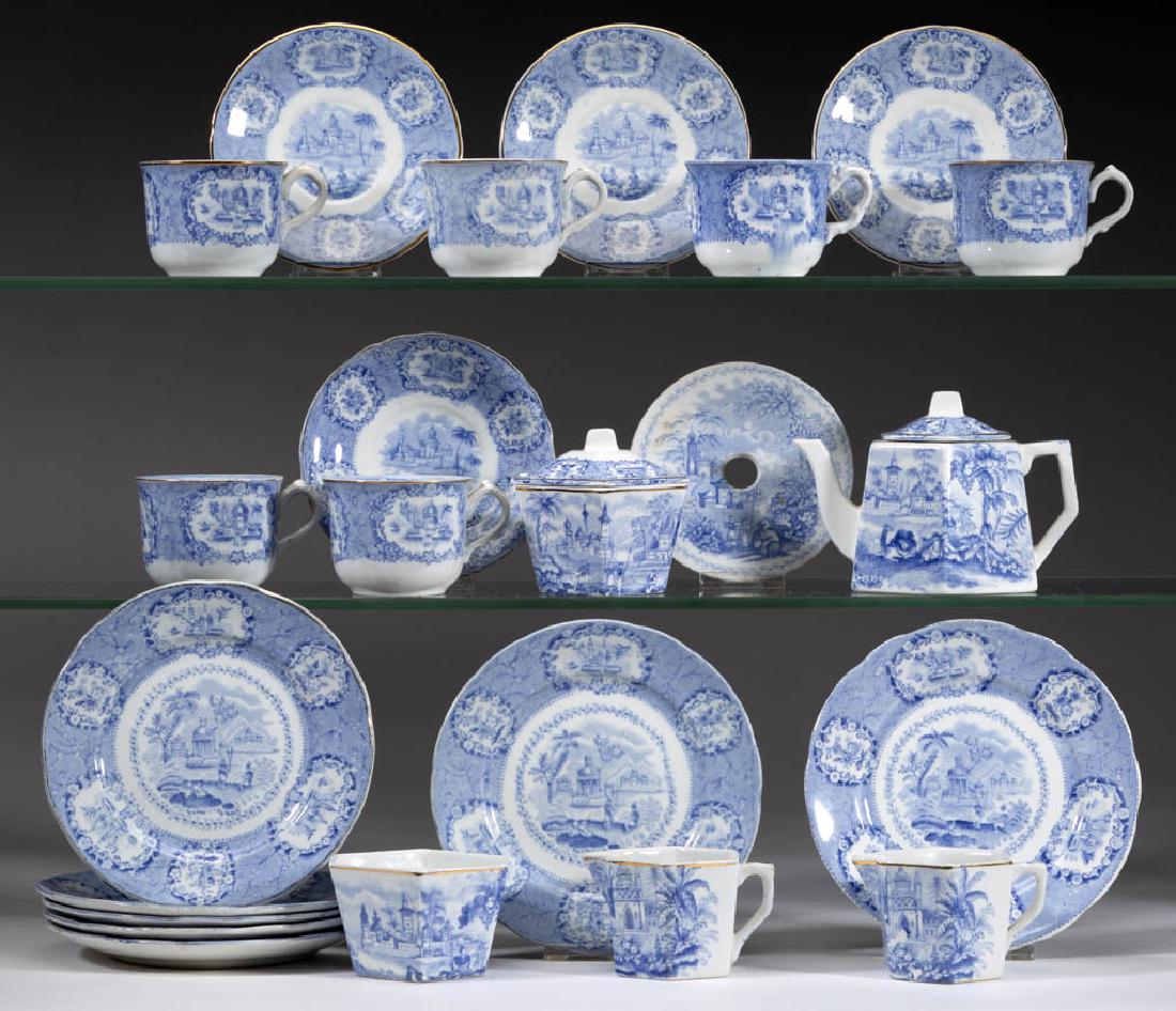ENGLISH STAFFORDSHIRE "ORIENTAL" TRANSFER-PRINTED: ENGLISH STAFFORDSHIRE "ORIENTAL" TRANSFER-PRINTED CERAMIC CHILDREN'S TOY 23-PIECE TEA SET, comprising a covered teapot, two creamers, one covered sugar, one 3" x 2 3/4" waste bowl, one 4" D tea tile, 
