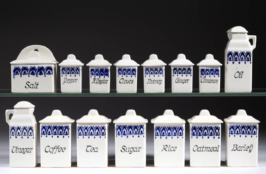GERMAN PORCELAIN CHILDREN'S TOY 15-PIECE CANISTER SPICE: GERMAN PORCELAIN CHILDREN'S TOY 15-PIECE CANISTER SPICE SET, comprising one 3" HOA wall salt box, twelve canisters including "Oatmeal", "Flour", "Ginger", and "Allspice", and two 4 1/4" HOA vinegar an