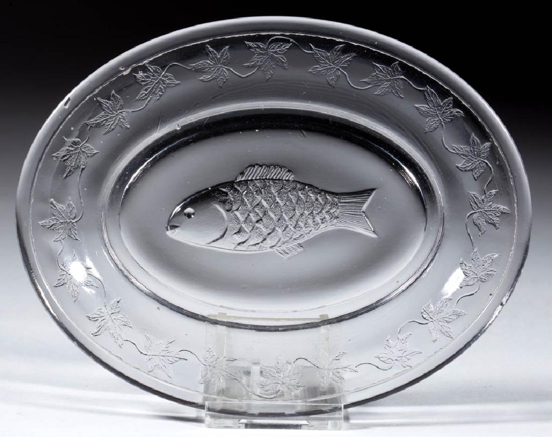 WABASH FISH CHILDREN'S TOY ICE CREAM TRAY: WABASH FISH CHILDREN'S TOY ICE CREAM TRAY, colorless, with a vine pattern embossed around the exterior and a fish in the center. Bryce, Higbee & Co. Circa 1914. 4 1/2" x 5 3/4". Undamaged. Literature: