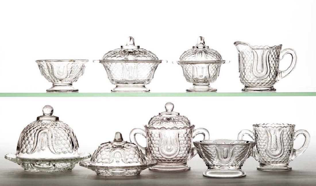 TULIP AND HONEYCOMB CHILDREN'S GLASS TOY ARTICLES, LOT: TULIP AND HONEYCOMB CHILDREN'S GLASS TOY ARTICLES, LOT OF NINE, colorless, including a four-piece table set, oval casserole dish, and a tureen. Federal Glass Co. Circa 1914. 1 3/4" to 3 3/4" HOA.Spoon