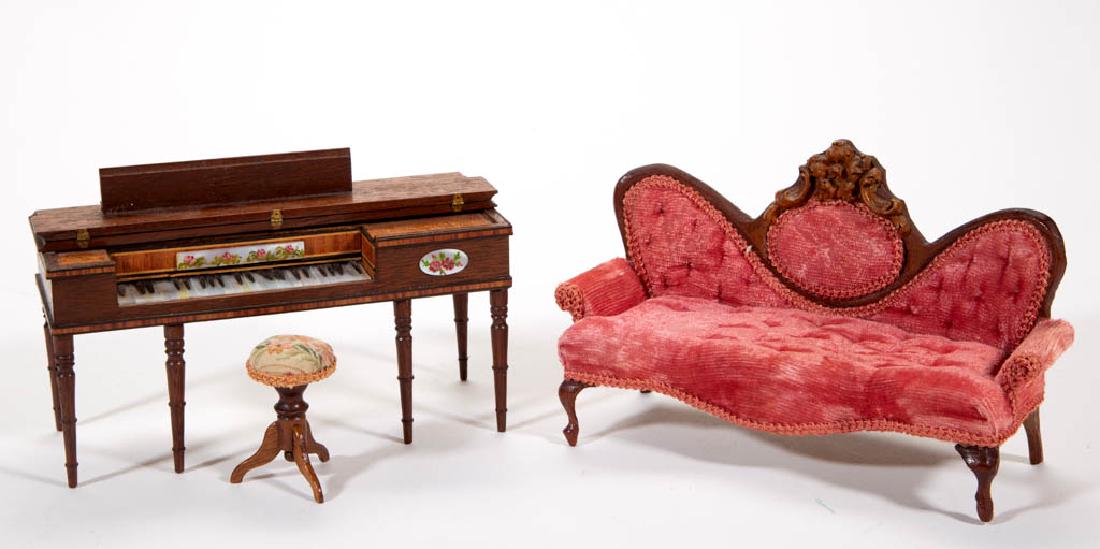 MELL PRESCOTT DOLLHOUSE / MINIATURE FURNITURE, LOT OF: MELL PRESCOTT DOLLHOUSE / MINIATURE FURNITURE, LOT OF THREE, comprising a Victorian-style settee with pink velveteen upholstery, a spinet piano, and a piano stool. Settee and piano with printed "Custo