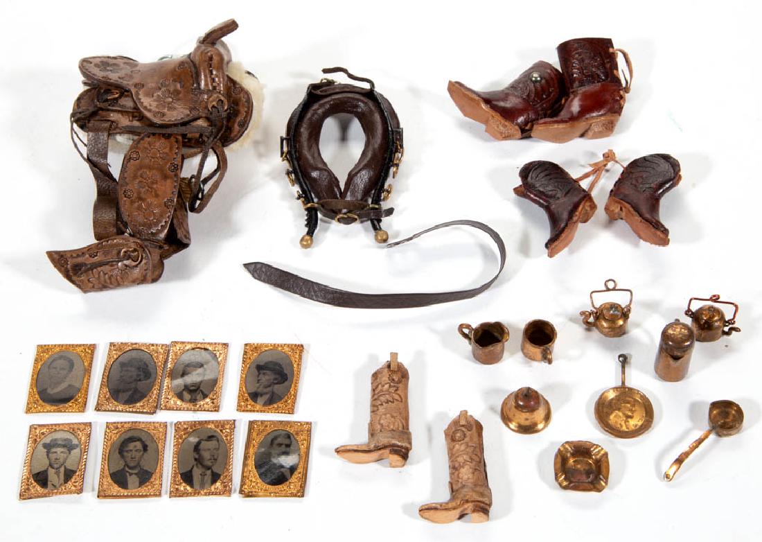 ASSORTED DOLLHOUSE / MINATURE ACCESSORIES, LOT OF 27: ASSORTED DOLLHOUSE / MINATURE ACCESSORIES, LOT OF 27, including a western horse saddle, three pairs of cowboy boots, eight tintype-style portraits, and a set of nine pieces made from pennies. Unmarked