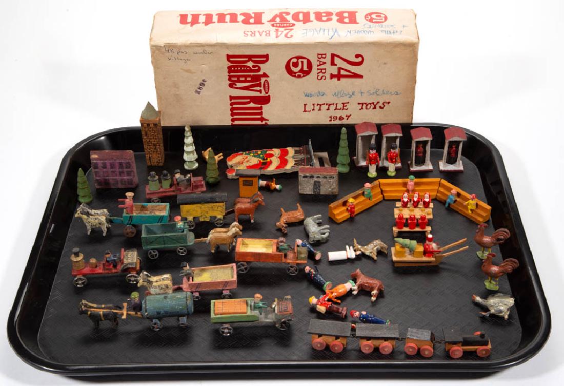 GERMAN CARVED AND PAINTED TOYS, LOT OF 47: GERMAN CARVED AND PAINTED TOYS, LOT OF 47, including five horse drawn vehicles, kept in a Baby Ruth box. 19th century. 3" H castle tower. Provenance: From a Pennsylvania private collection.