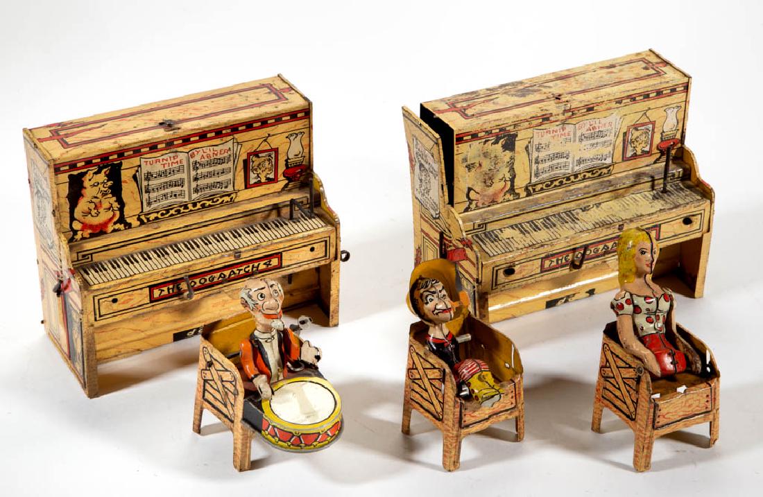 LIL ABNER'S DOG PATCH BAND TIN WIND-UP TOYS, LOT OF: LIL ABNER'S DOG PATCH BAND TIN WIND-UP TOYS, LOT OF FIVE, retaining three figures with seats (one detached but present). Mid 20th century. Piano 5 1/2" H, 6 1/2" W. As-found condition with expected we