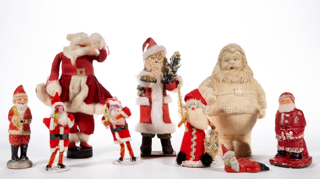 ASSORTED SANTA CLAUS FIGURES, LOT OF NINE: ASSORTED SANTA CLAUS FIGURES, LOT OF NINE, fabric, crepe paper, composition, and other construction. Three examples with "JAPAN" marks. 20th century. 1 1/2" to 8" HOA. Each with wear and minor imperfe