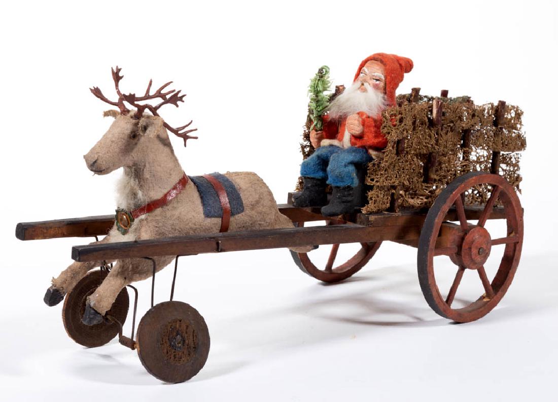 GERMAN SANTA CLAUS AND CART FIGURE / PULL TOY: GERMAN SANTA CLAUS AND CART FIGURE / PULL TOY, depicting a Santa figure with composition face and felt clothing holding a branch in one hand, sitting in a wooden cart pulled by an animated felt-covere