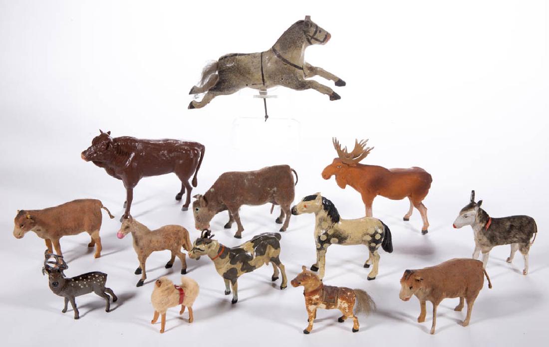 GERMAN AND OTHER ASSORTED ANIMAL FIGURES, LOT OF 13: GERMAN AND OTHER ASSORTED ANIMAL FIGURES, LOT OF 13, having composition/papier-mache, wood, and other construction, including a moose, four cows, and four horses. Moose and smallest horse with "German