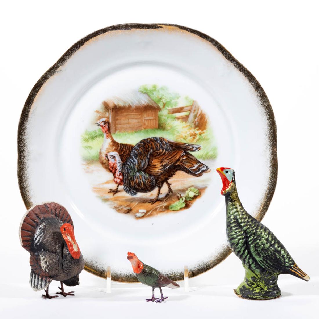 GERMAN COMPOSITION / PAPIER-MACHE TURKEY FIGURES, LOT: GERMAN COMPOSITION / PAPIER-MACHE TURKEY FIGURES, LOT OF THREE, each having polychrome-painted finish, two with metal feet. Two with printed "Germany" marks, largest example with printed "Made in / We
