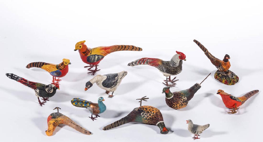 GERMAN COMPOSITION / PAPIER-MACHE BIRD FIGURES, LOT OF: GERMAN COMPOSITION / PAPIER-MACHE BIRD FIGURES, LOT OF 12, including a goose, a peacock, and pheasants. Two with printed "Germany" marks, otherwise unmarked. First half 20th century. 1 1/8" to 2 1/2" 
