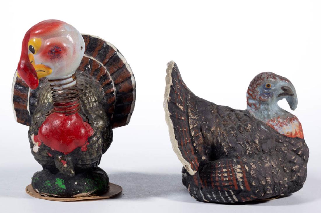 GERMAN COMPOSITION / PAPIER-MACHE TURKEY CANDY: GERMAN COMPOSITION / PAPIER-MACHE TURKEY CANDY CONTAINERS, LOT OF TWO, comprising a sitting example and an example with a bobblehead. Bobblehead example with printed "Made in Germany / US-Zone" mark t
