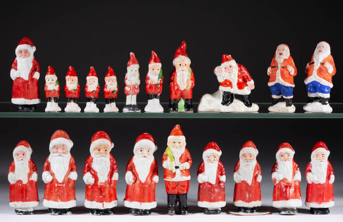 JAPANESE SANTA CLAUS BISQUE MINIATURE FIGURES, LOT OF: JAPANESE SANTA CLAUS BISQUE MINIATURE FIGURES, LOT OF 17, Together with three plaster/composition figures. Each piece with "JAPAN" mark. Twenty (20) pieces total. First half/mid 20th century. 2" to 4"