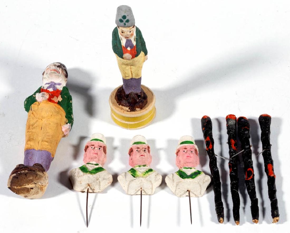ASSORTED ST. PATRICK'S DAY COMPOSITON / PAPIER-MACHE: ASSORTED ST. PATRICK'S DAY COMPOSITON / PAPIER-MACHE FIGURAL ARTICLES, LOT OF NINE, comprising a candy container, a figure, three busts on pins, and four canes with pins. Unmarked. First half 20th cen